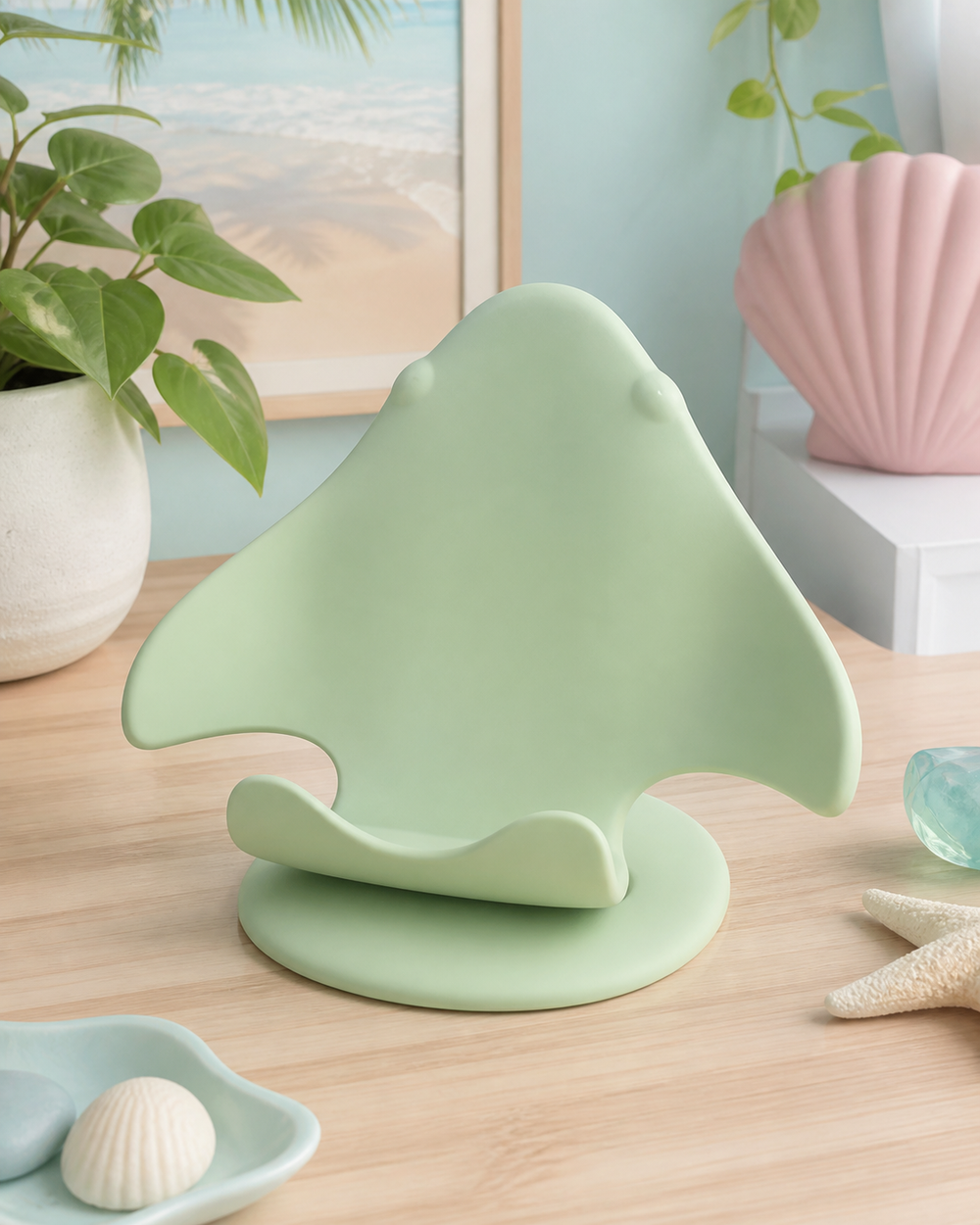 Green manta ray phone stand on a pastel desk, coastal cute room decor preview