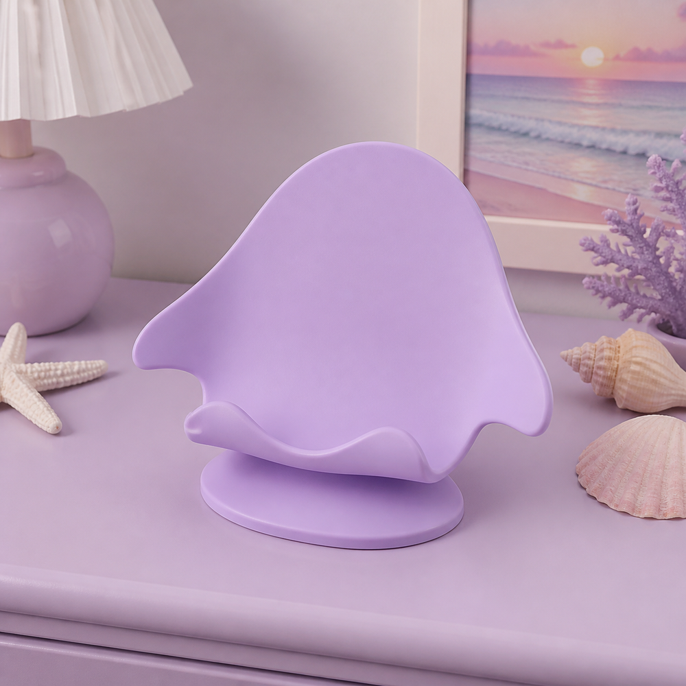 Purple manta ray phone stand on a pastel desk, coastal cute room decor preview