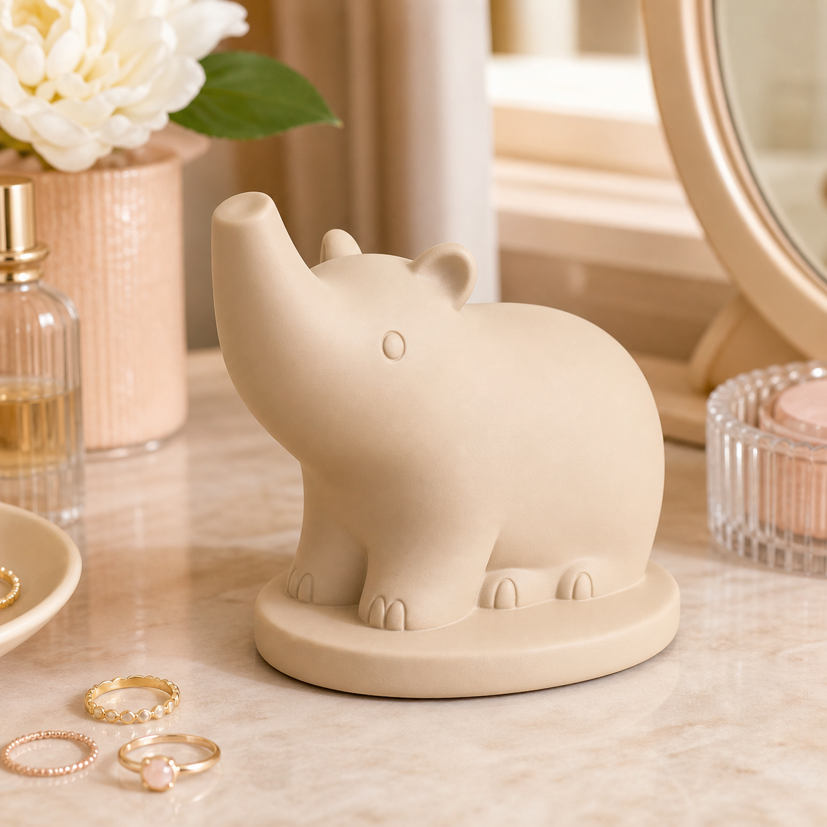 Pastel beige tapir ring holder in a cute vanity scene