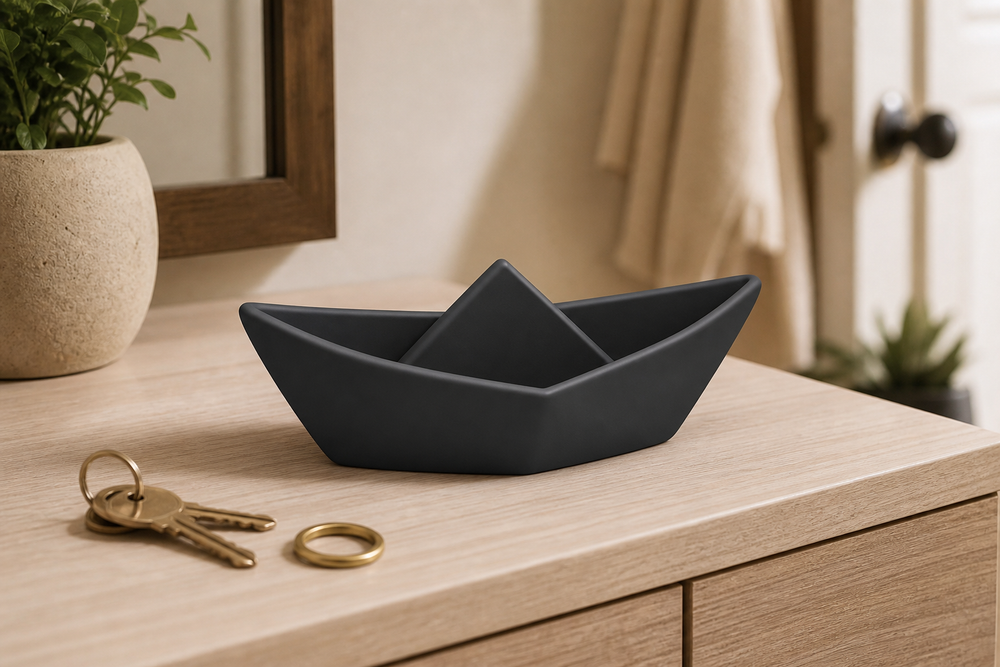Black origami boat key bowl, pastel catchall dish and entryway desk decor
